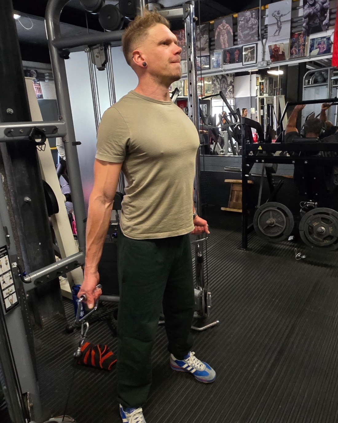 Matt training on the cable machine